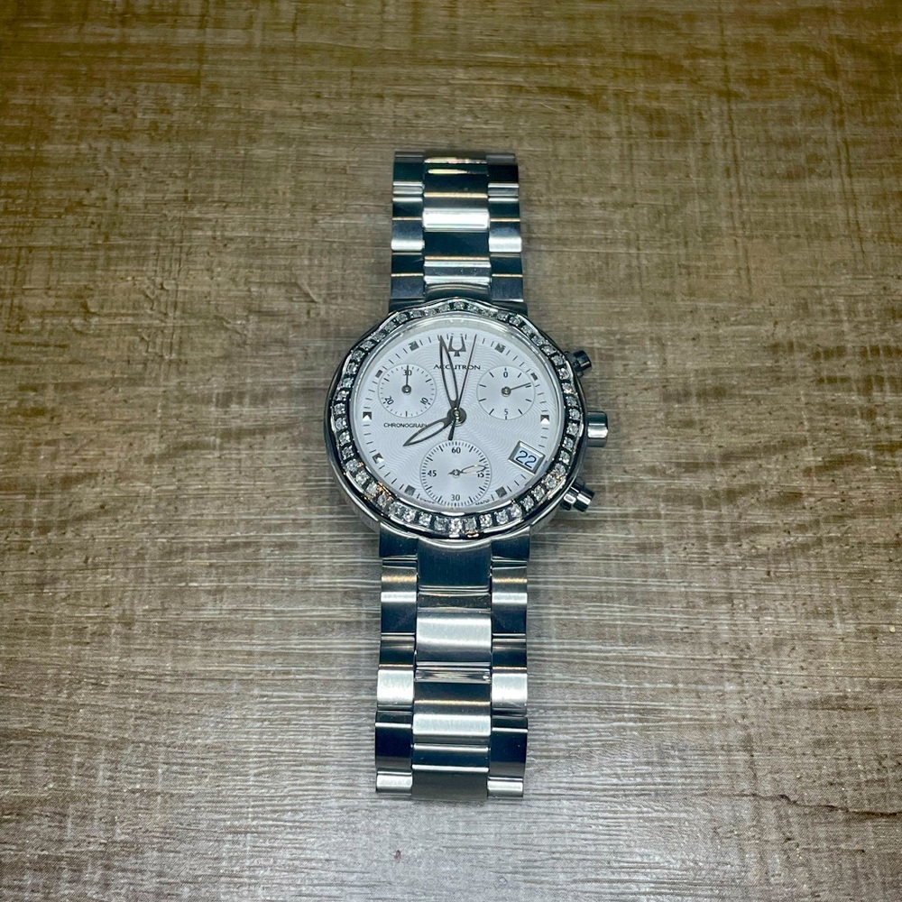 Bulova Accutron Silver Tone Women's Chronograph Watch with White Dial.